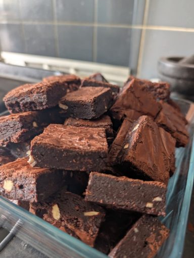 Gorgeous, gooey, chewy brownies with that crackly finish on top! A tray of these will not last 10 minutes in any house!